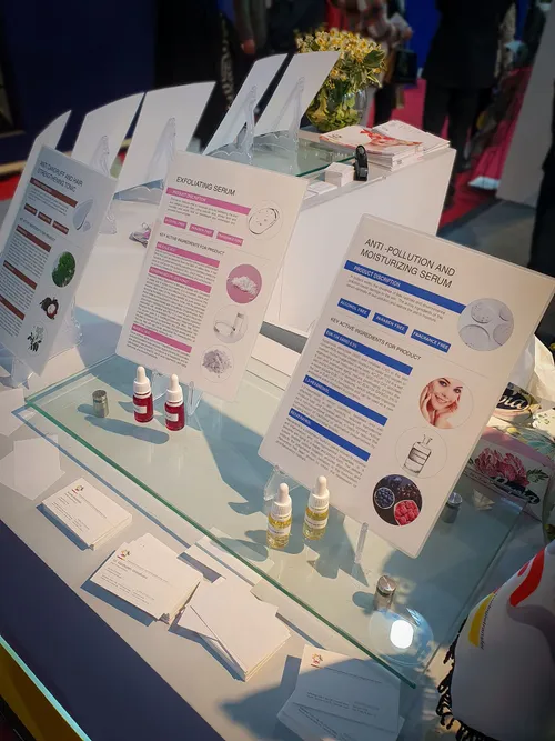 Glass shelf with serum sample bottles and product description cards