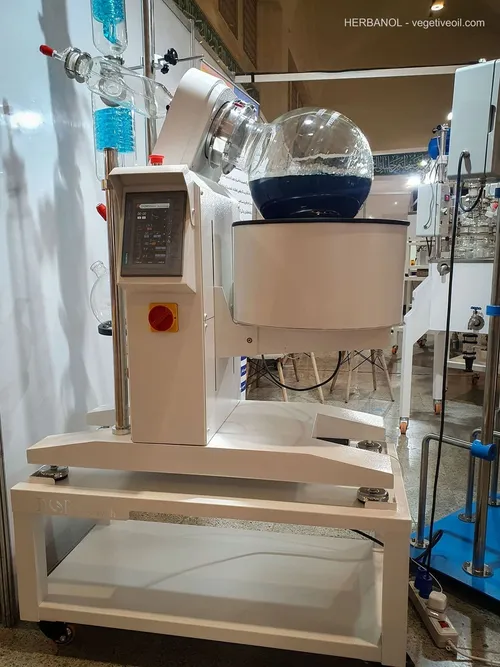 DorsaTech rotary evaporator with round flask on white cart